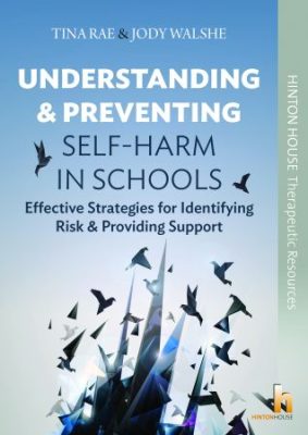 A teacher and student working together to identify and address the student's emotional triggers in a classroom setting
